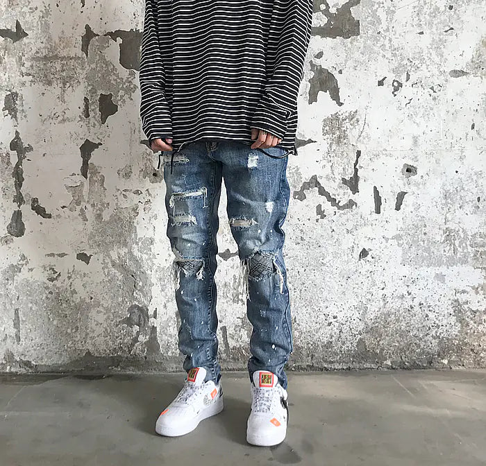 Knee Patch Distressed Denim Jeans with Paint Splatter