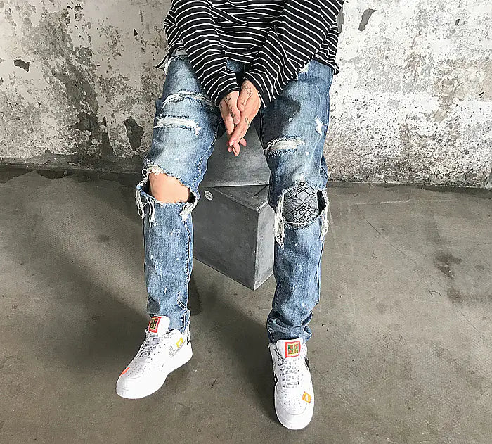 Knee Patch Distressed Denim Jeans with Paint Splatter