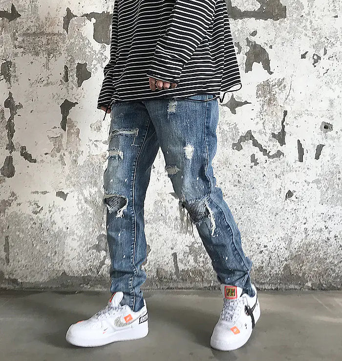 Knee Patch Distressed Denim Jeans with Paint Splatter