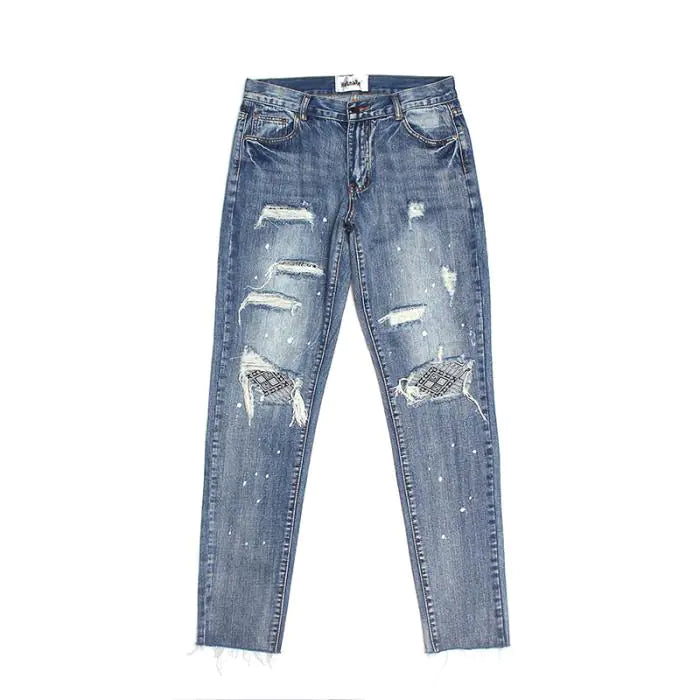 Knee Patch Distressed Denim Jeans with Paint Splatter
